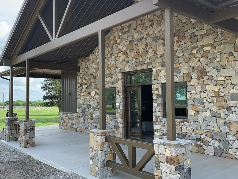 Stone porch columns and timber trusses