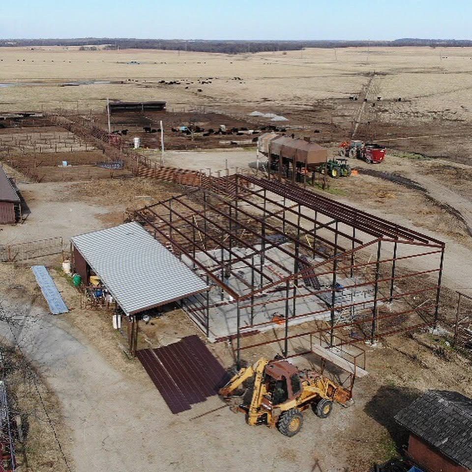 Aerial view of red iron steel frame going up