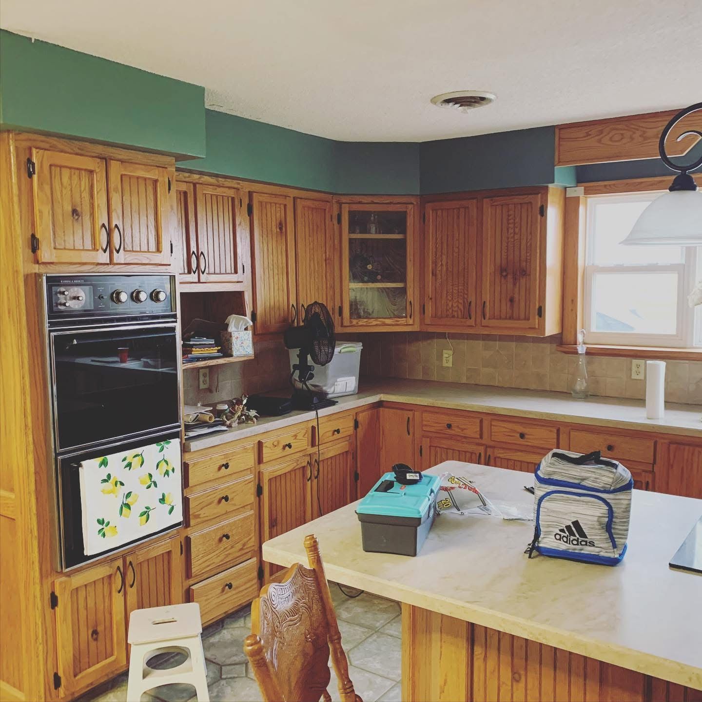 Kitchen before remodel with oak cabinets
